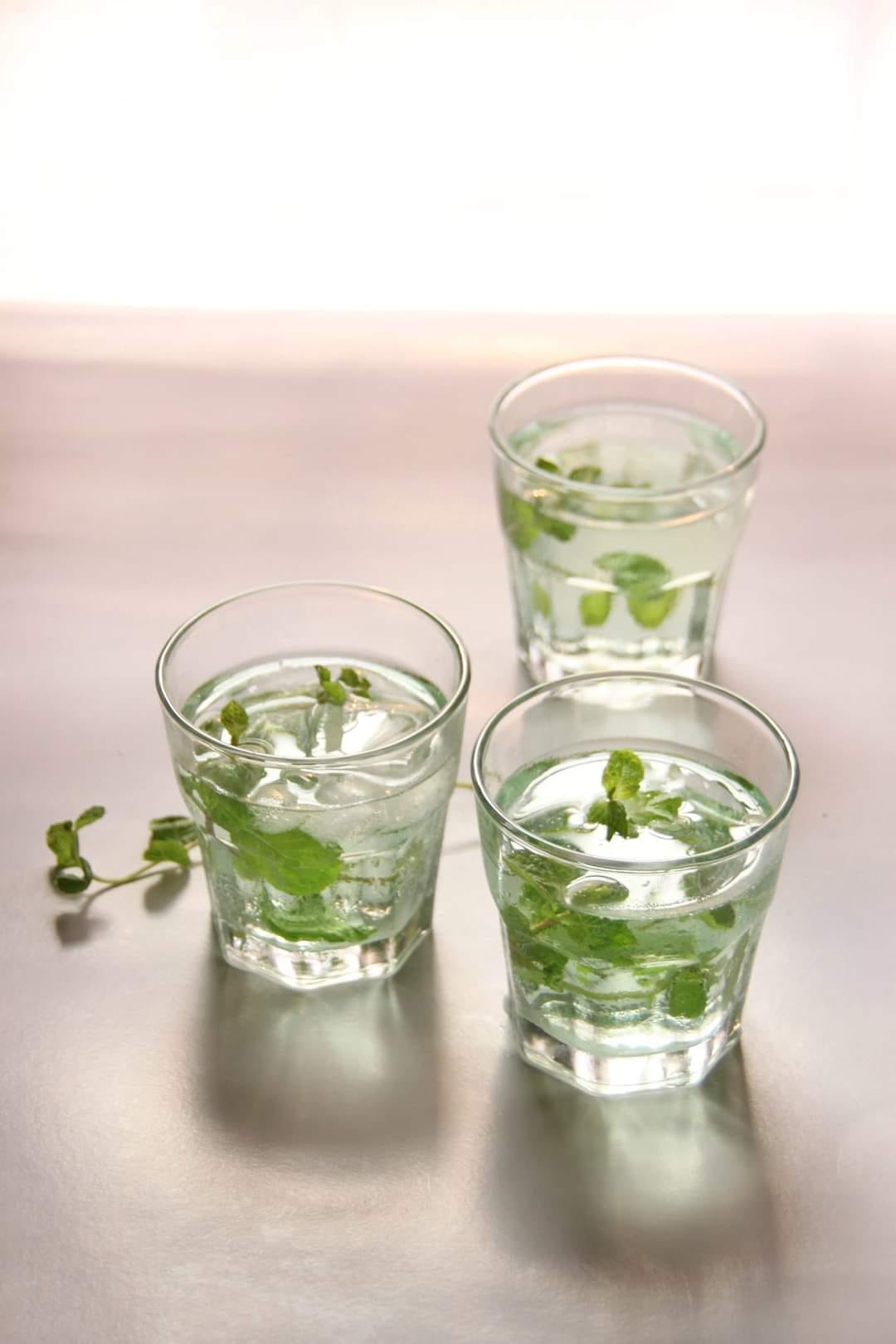 Glasses with mint and water